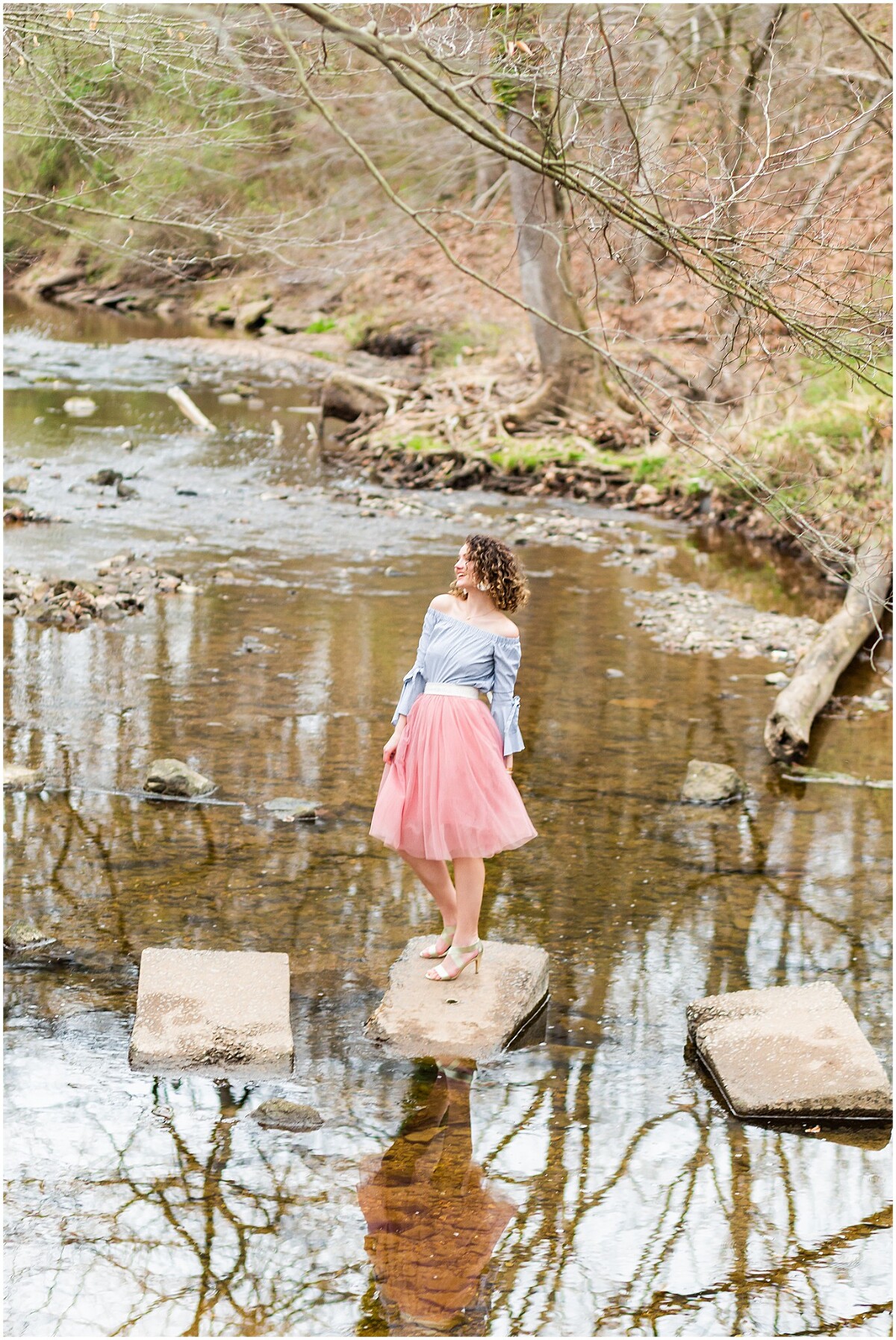 Oh my, how fun it was to photograph Matea for her high school senior session! We went to Ellanor Lawrence Park in Fairfax, Virginia, and had a lovely time on their footbridge and splashing around in the little stream underneath. They also had a beautiful tulip magnolia tree that we took some photos under! Click the link to see her FULL SPRING SENIOR SESSION! Photo by Bethanie Vetter Photography LLC. Website: bethanievetter.com #springseniorphotos #seniorphotos #virginiasenior #seniorportraits #springphotos #springflowers #footbridge #footbridgephotos #eclawrence #eclawrencepark #waterphotosession #stream #riverphotos #springseniorphotos #springsenior #floralsesssion #floralphotos #flowercrown #bethanievetterportraits #bethanievetterphotography #curlyhair #curlygirl #tulipmagnolia #tulipmagnoliatree #tulleskirt