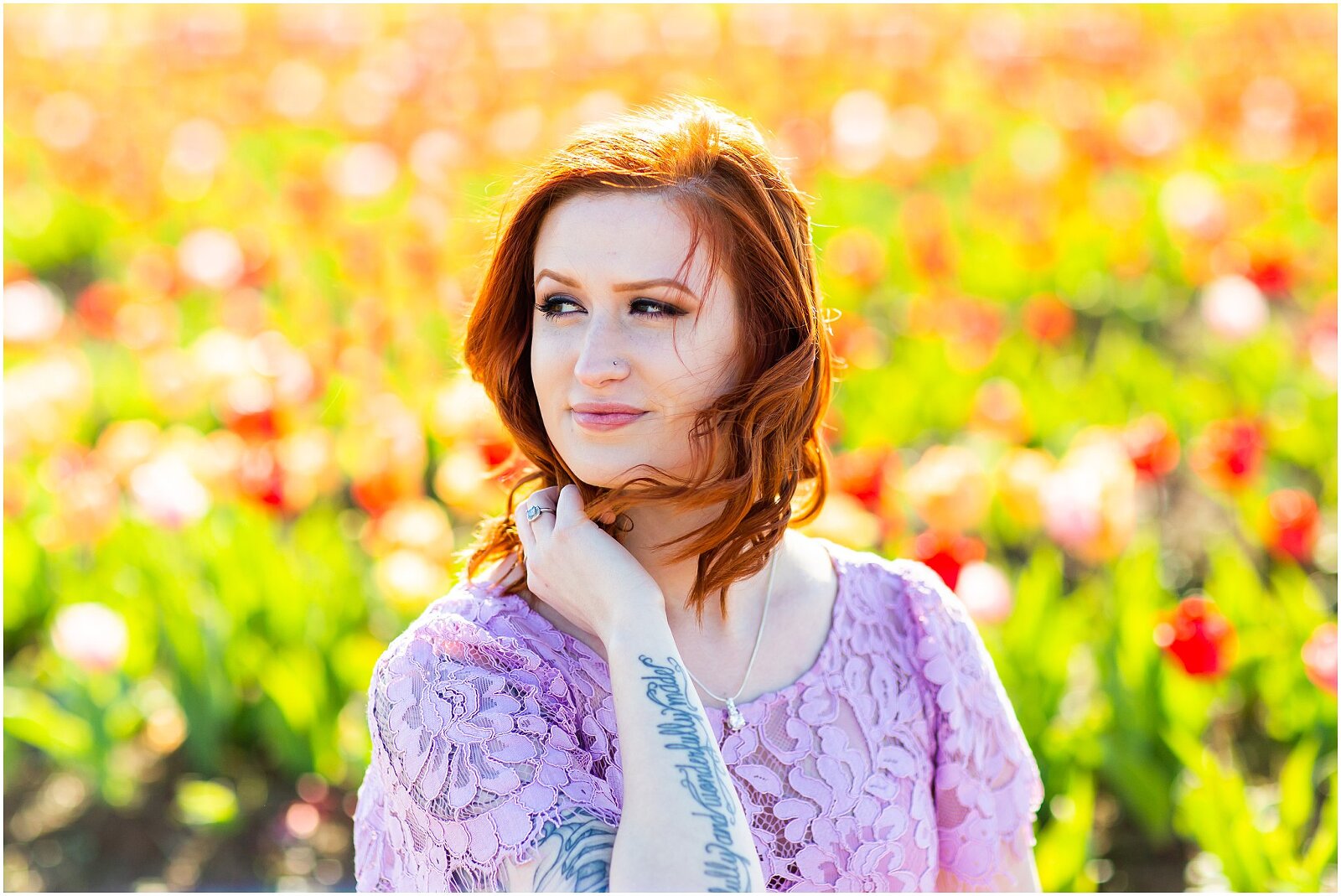 Heather’s BEAUTIFUL college grad photos took place in the Tulip Field at Burnside Farms in Nokesville, Virginia. With her beautiful red hair and lilac dress, this TULIP SENIOR SESSION blew me away!! It was a perfect spring day in April, and we had the field almost to ourselves. Click the link to see her FULL TULIP SENIOR SESSIONS! Photo by Bethanie Vetter Photography LLC. Website: bethanievetter.com #tulipseniorphotos #seniorphotos #virginiasenior #seniorportraits #springphotos #springflowers #springtulips #tulips #tuliplove #springseniorphotos #springsenior #floralsesssion #floralphotos #tuliphotos #bethanievetterportraits #bethanievetterphotography #lilacdress #purpledress #redhair #auburn